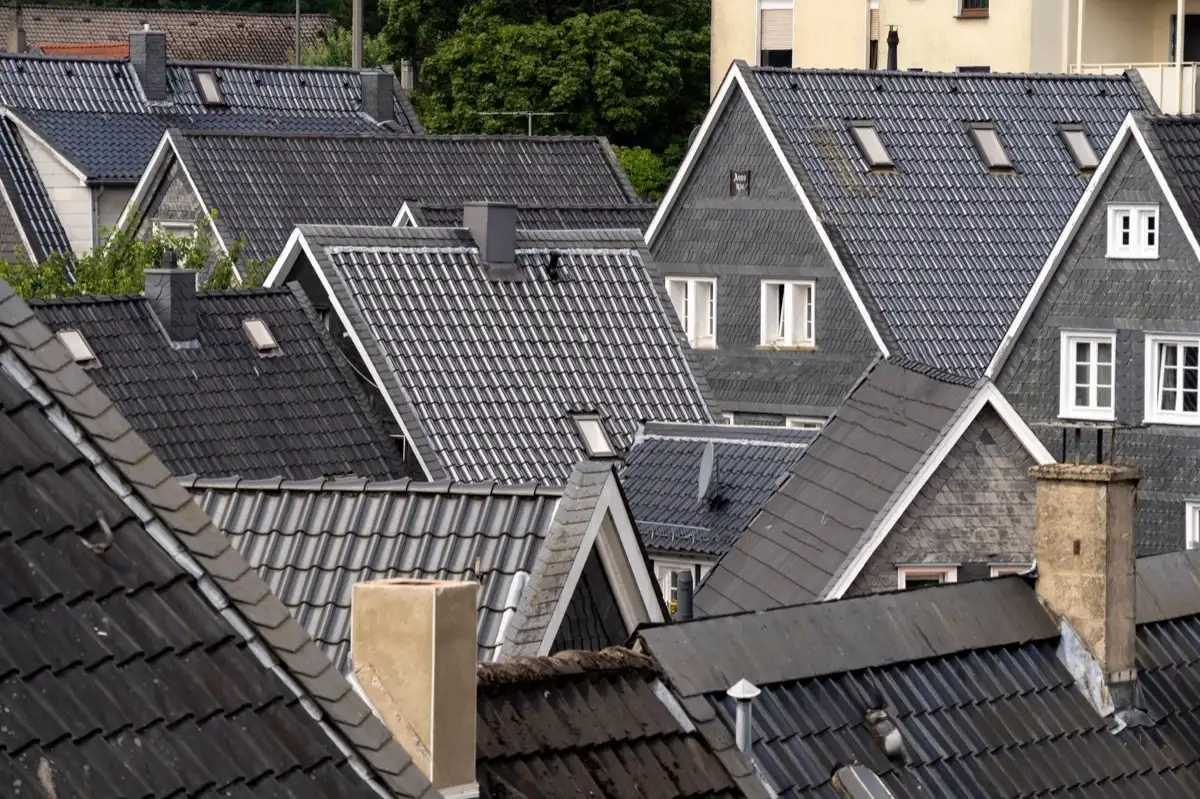 Steep roof eaves and gutter lines on houses in Escondido, CA